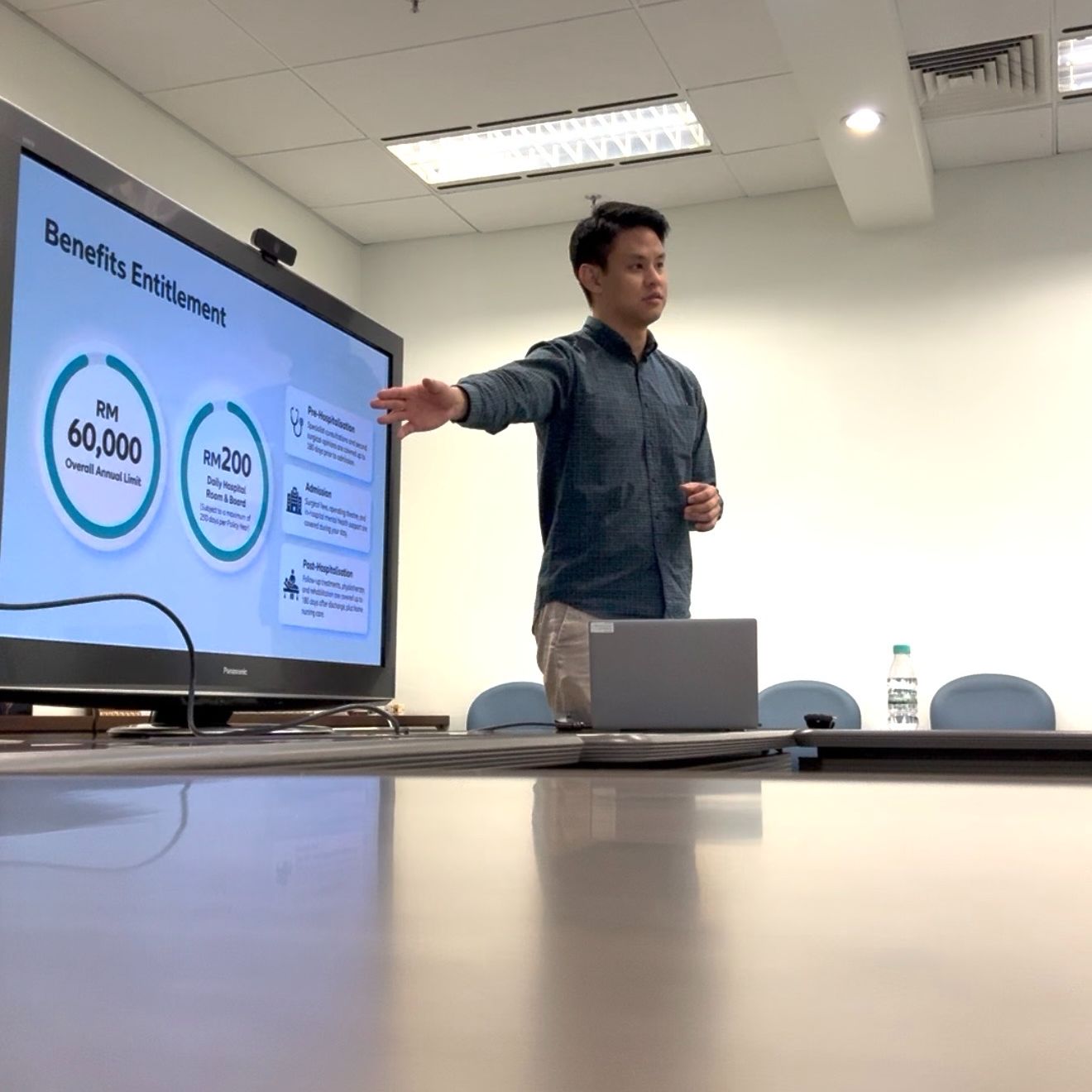 Alan Teong walking a client&rsquo;s team through their employee benefits plan